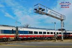 Four Siemens coaches between a pair of Chargers